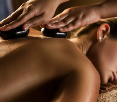 Massage with hot basalt stones