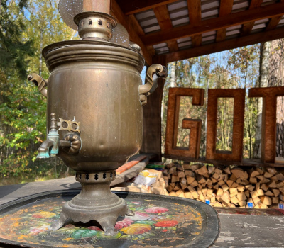 Wood-fired samovar with herbal tea